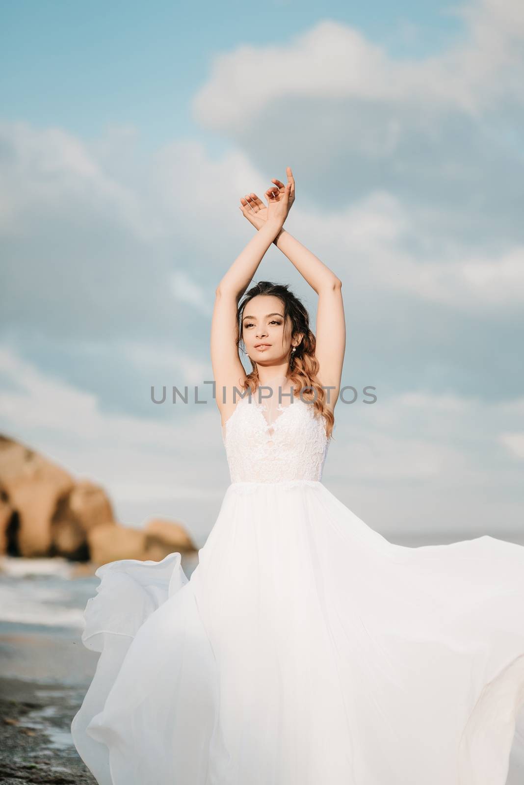 bride on the shore of the black sea by Andreua