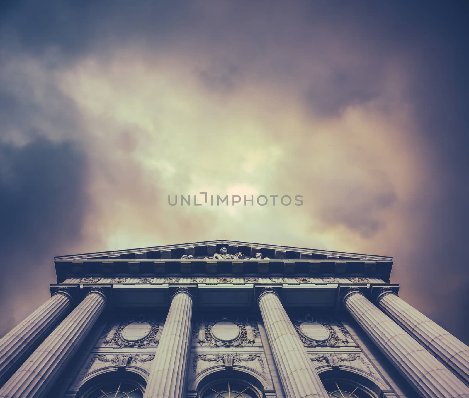 Retro Vintage Style Image Of A City Hall Or Courthouse Against A Stormy Sky