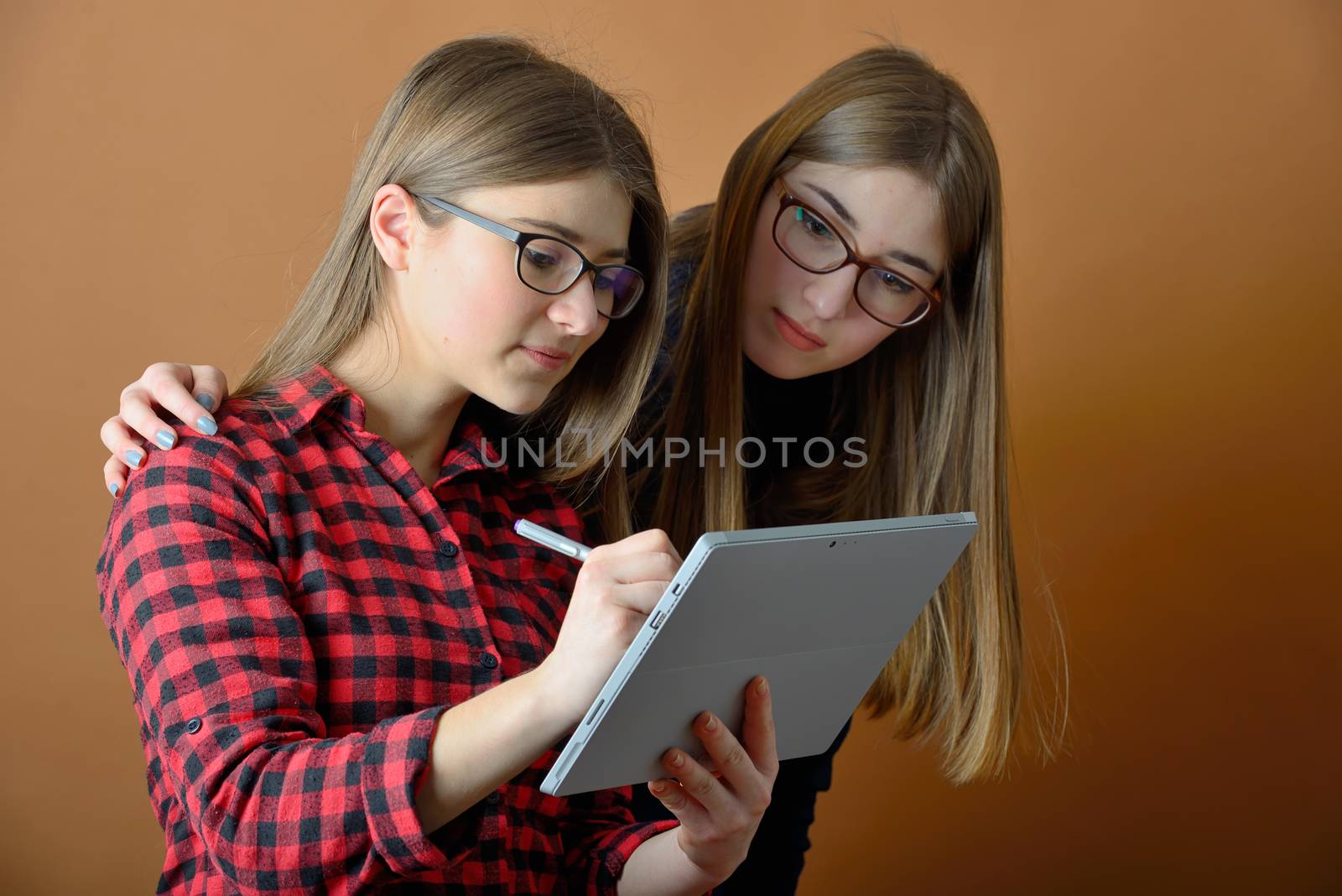 Young teenage girls with a tablet by mady70