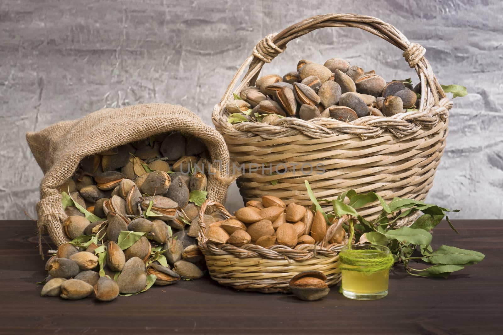 Almonds over rustic wooden board. by osmar01