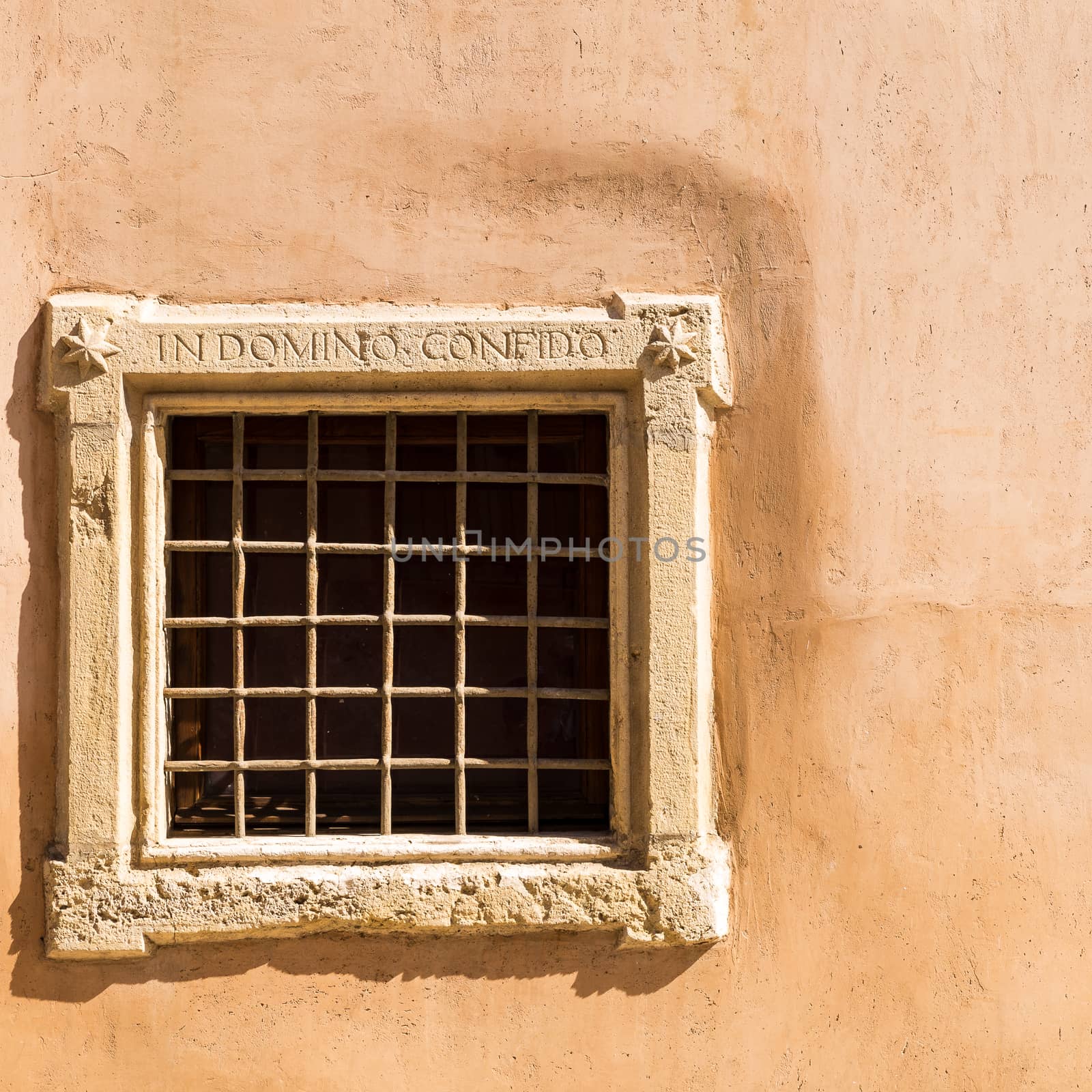 Assisi (Italy): Window on medieval stone wall