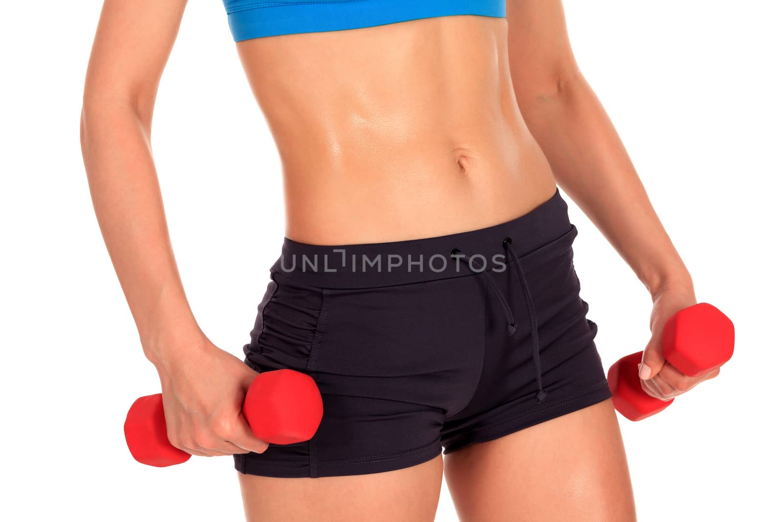 Beautiful body of a young fit slim woman lifting dumbbells isola by Nobilior