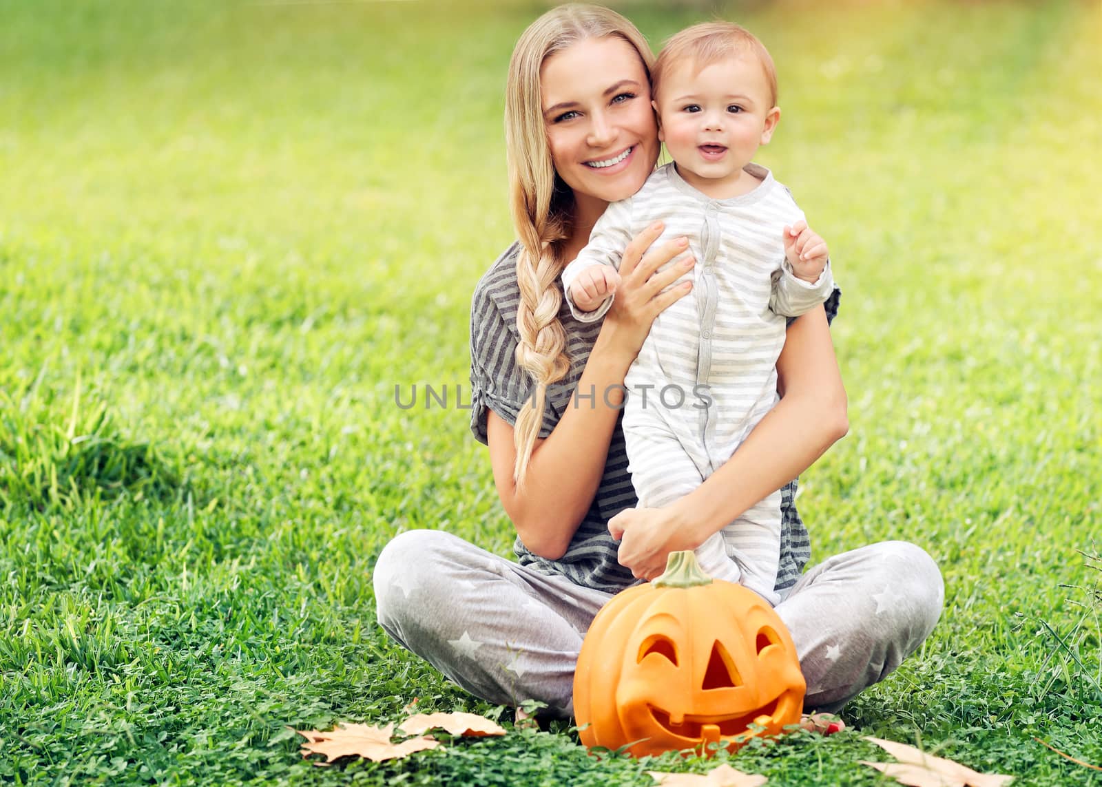 Mother and baby enjoying Halloween by Anna_Omelchenko