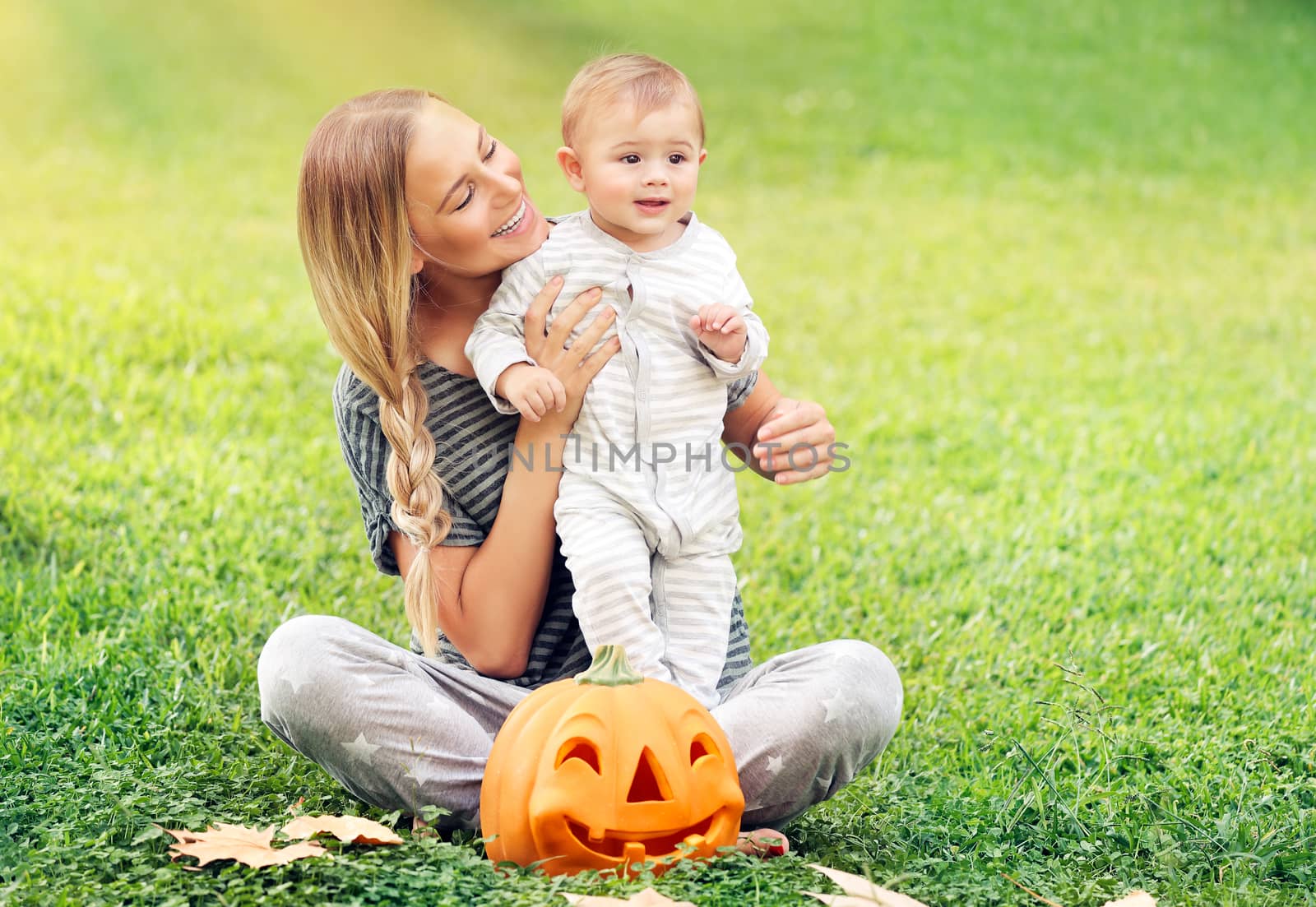 Mother and baby enjoying Halloween by Anna_Omelchenko