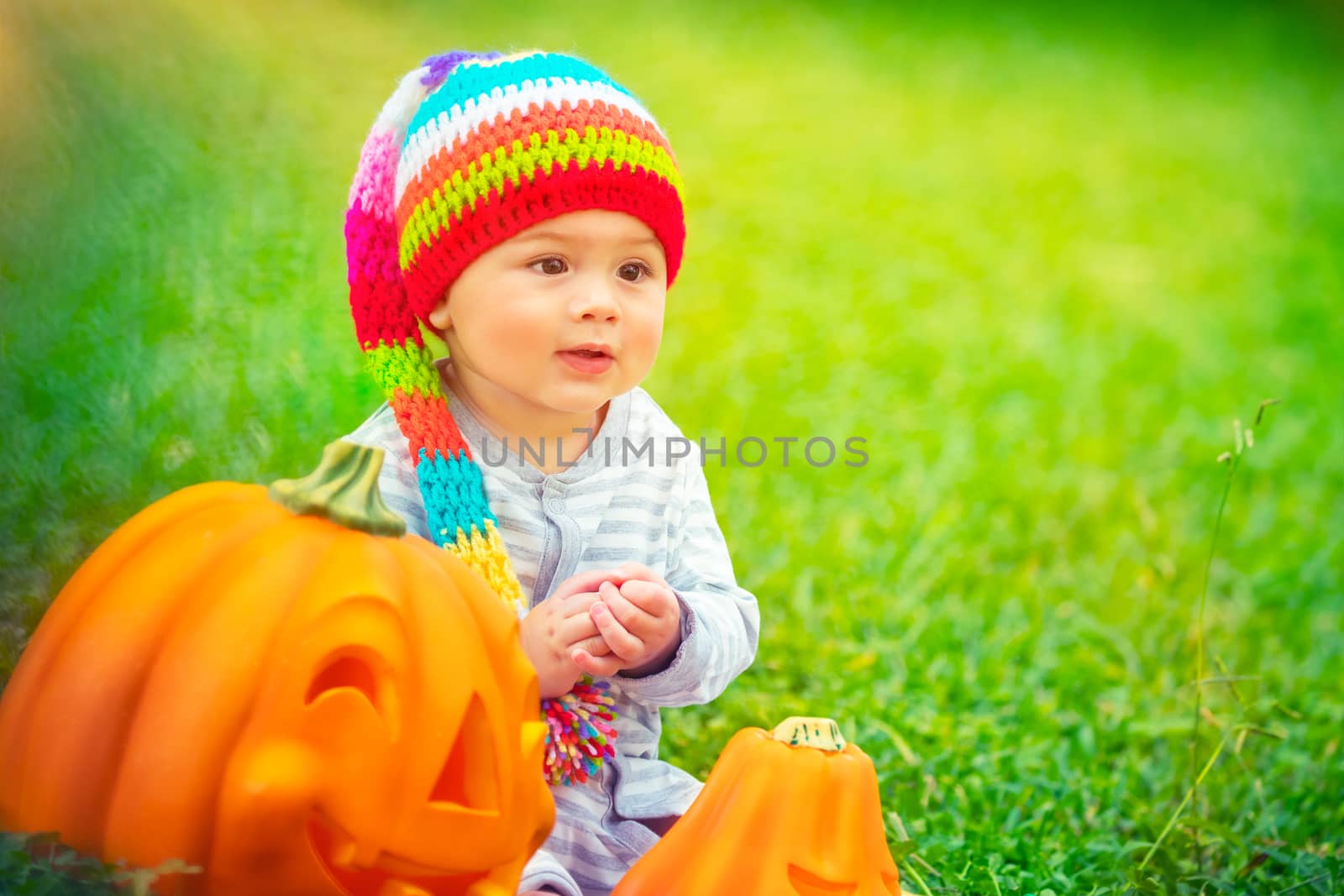 Pretty child with Halloween pumpkins by Anna_Omelchenko