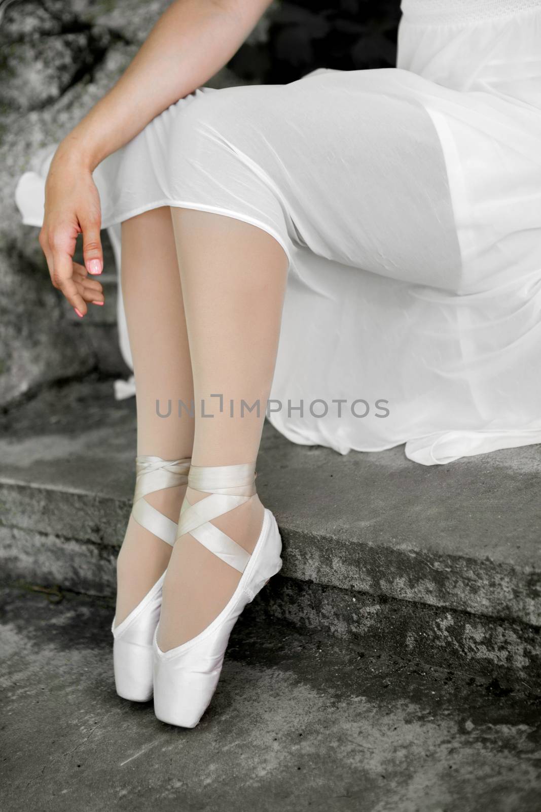 Legs of a beautiful ballerina close-up. by sermax55