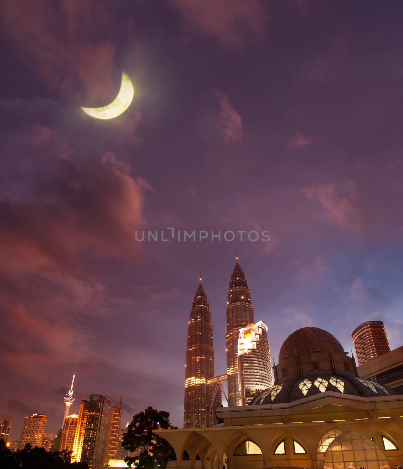 Night view of famous Asy-Syakirin Mosque with Petronas Towers by szefei