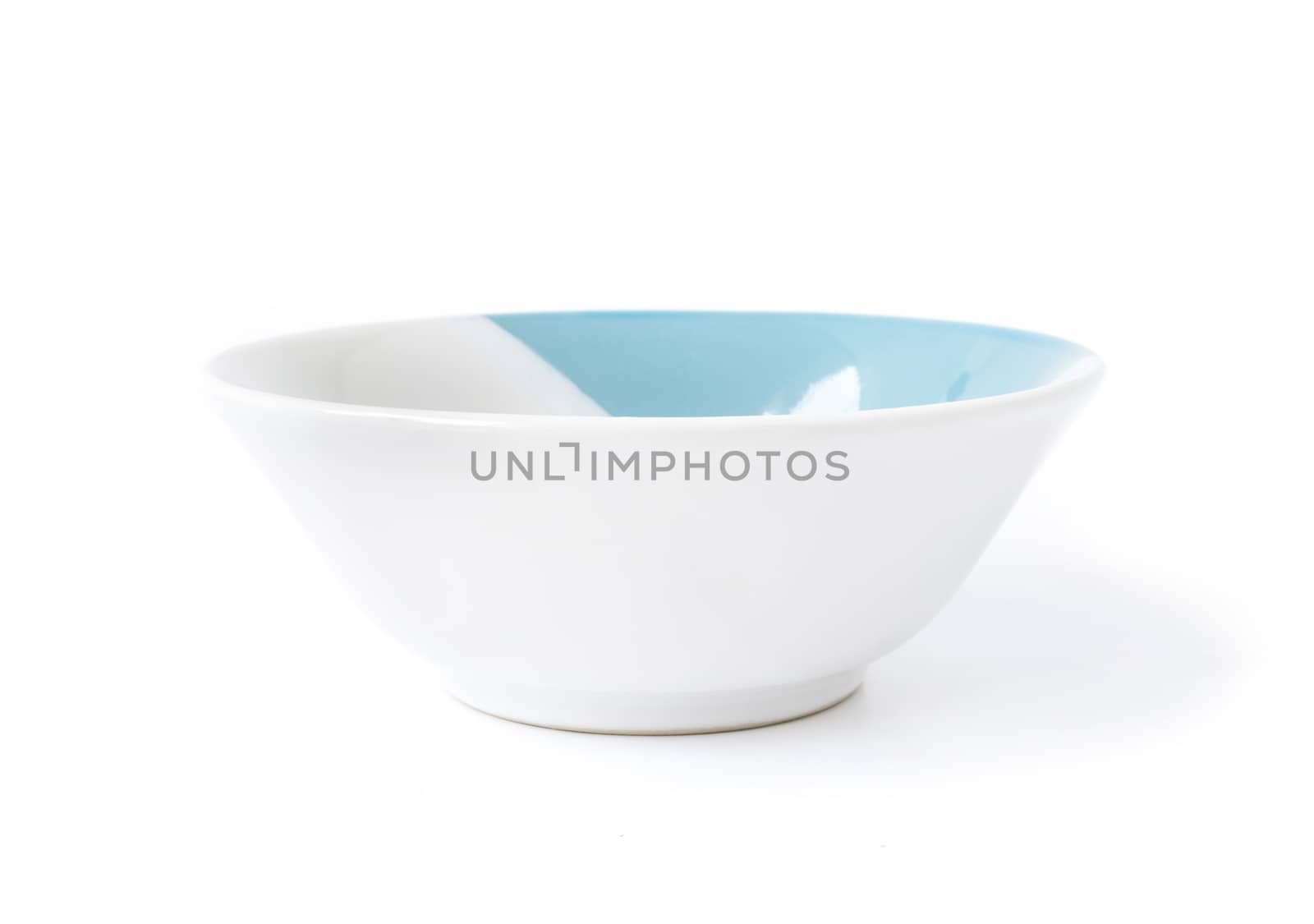 White ceramic bowl on white background