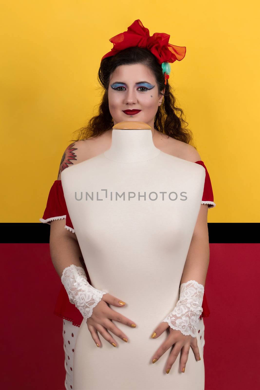 View of pinup vintage girl next to a colorful pop art backdrop.