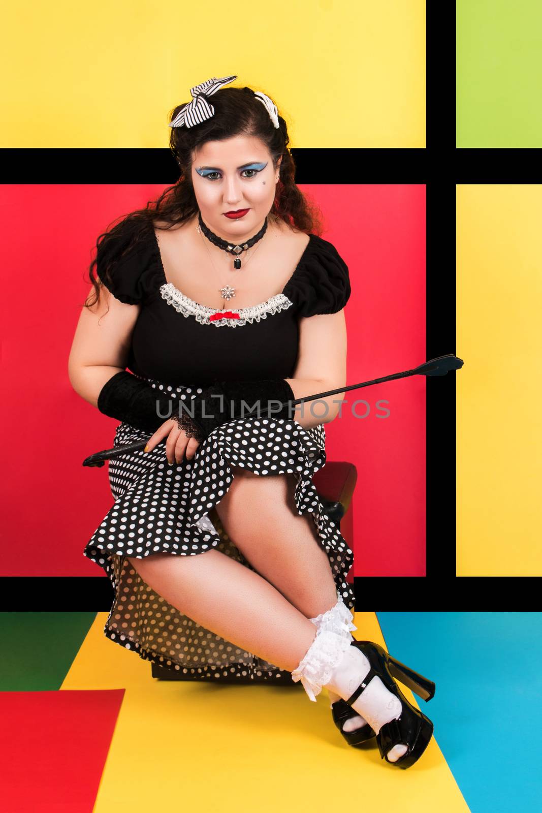 Pinup girl in pop art backdrop by membio