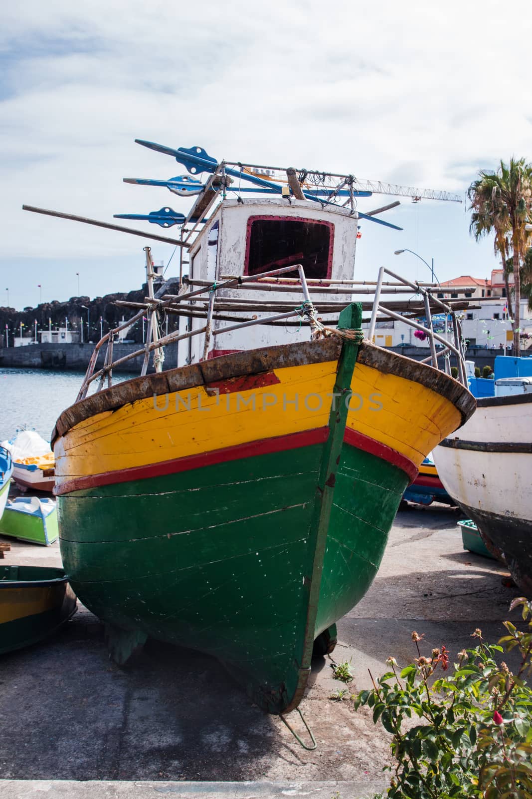 Traditional fishing boats on the shoreline of Camara de Lobos, Madeira.