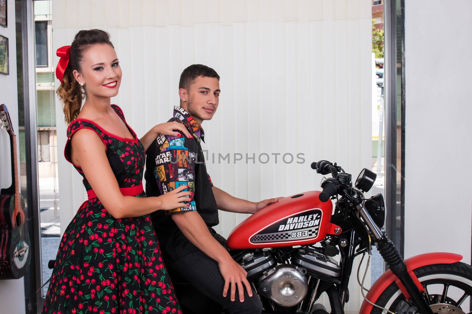 Vintage couple in a motorbike by membio