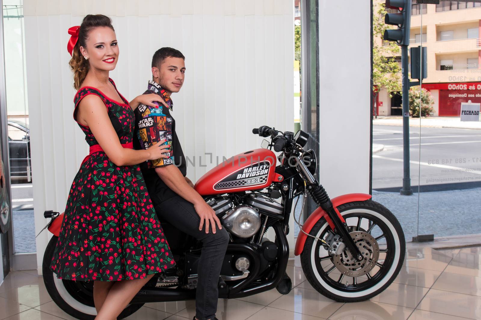 Vintage couple in a motorbike by membio