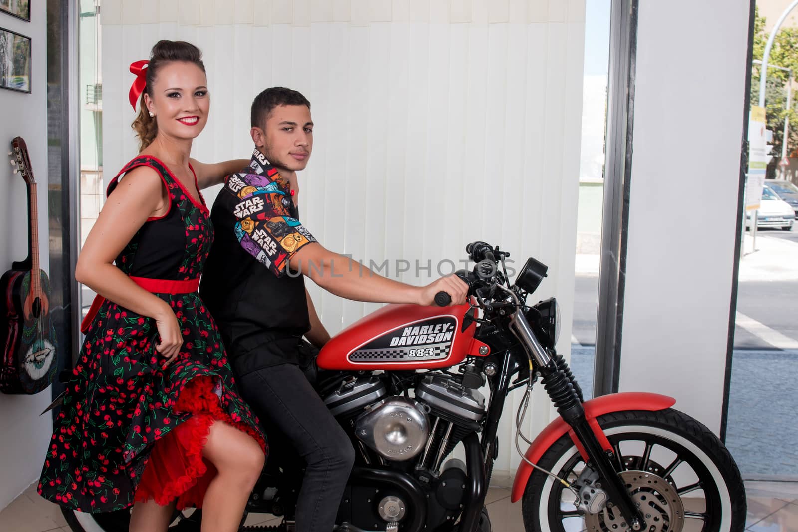 Vintage couple in a motorbike by membio