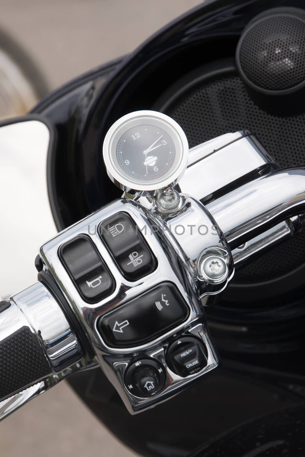 Close view detail of the shiny details of a classic motorcycle.