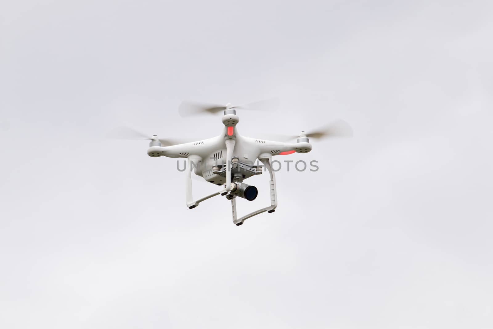 View of a small consumer quadrocopter drone in flight.