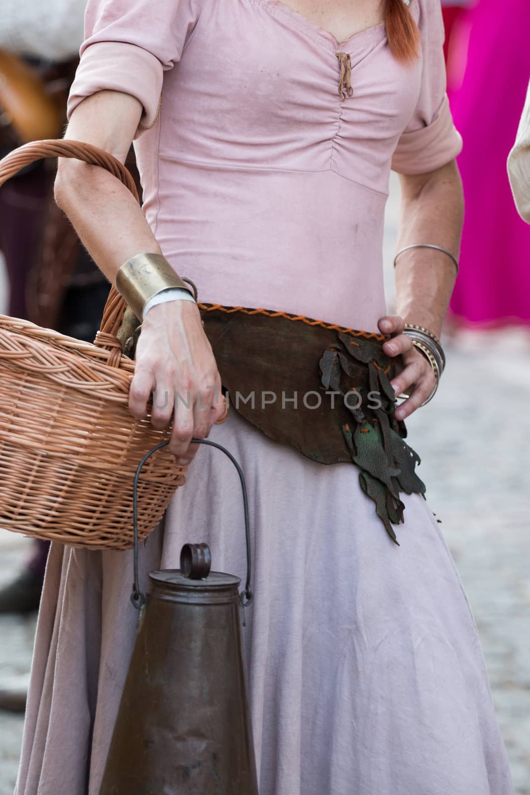 Close view detail of a medieval outfit recreation, of common poor countryside woman.