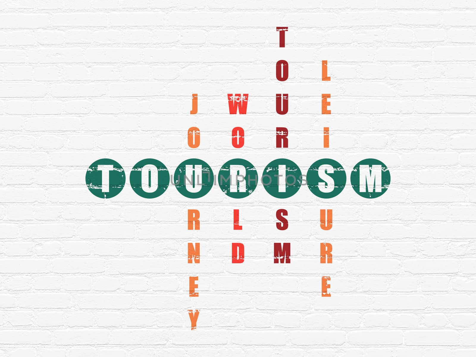 Travel concept: Painted green word Tourism in solving Crossword Puzzle