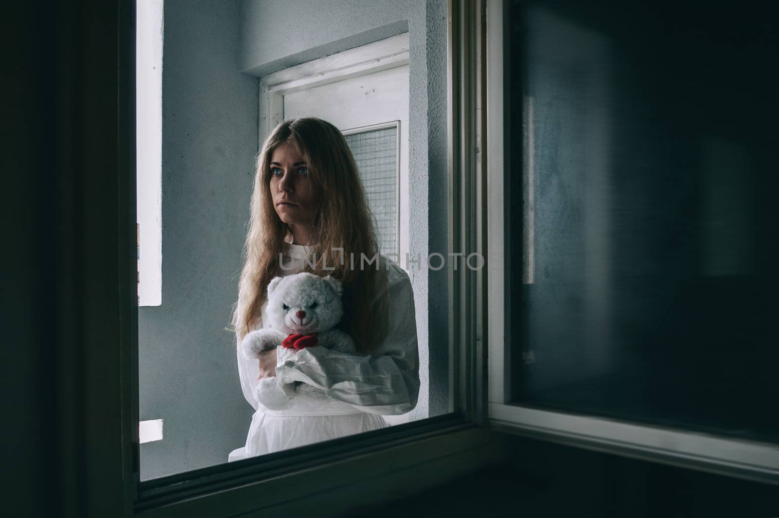 mentally ill girlwith a straitjacket in a Psychiatric