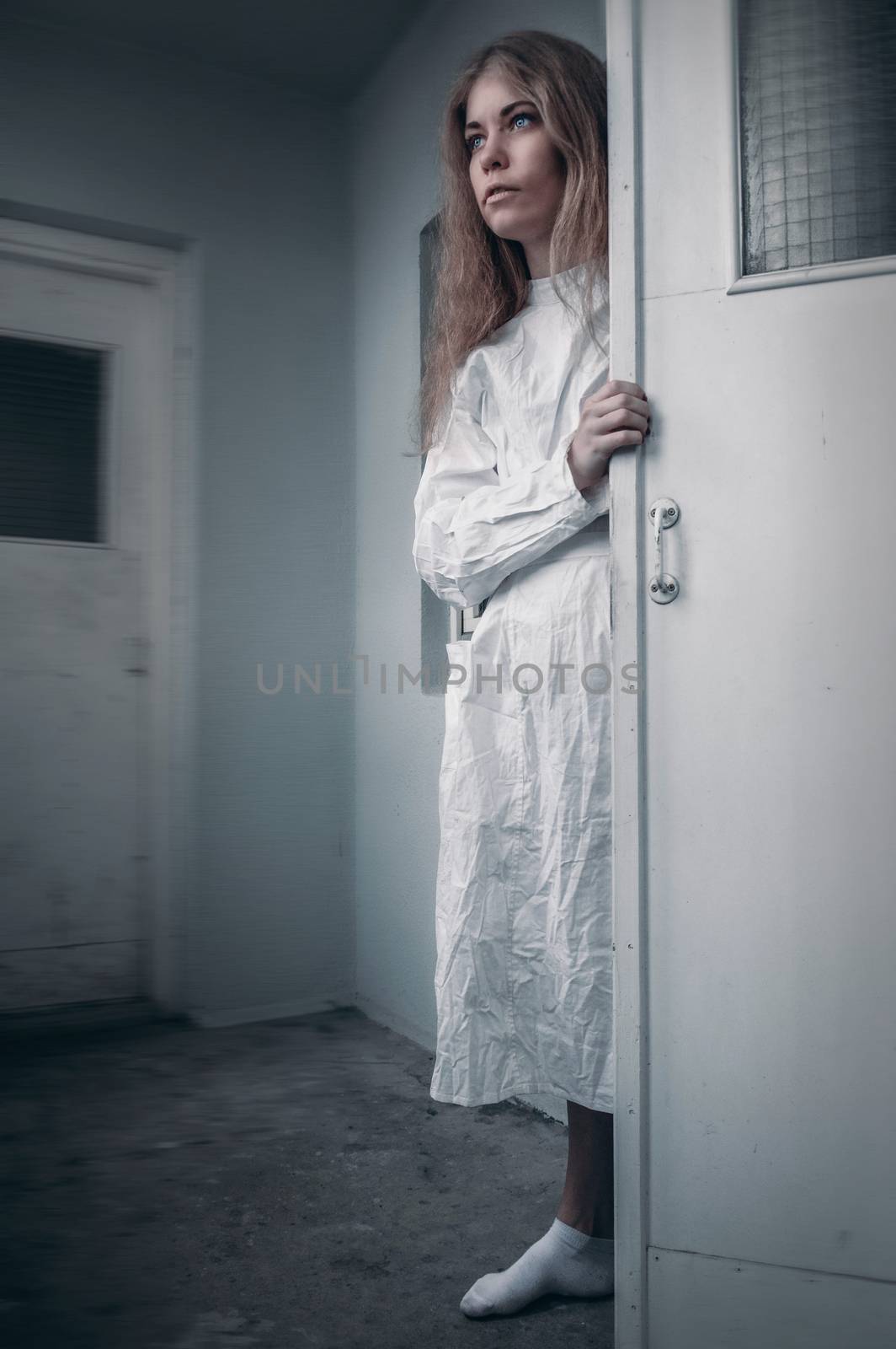 mentally ill girl with straitjacket in a Psychiatric by natali_brill