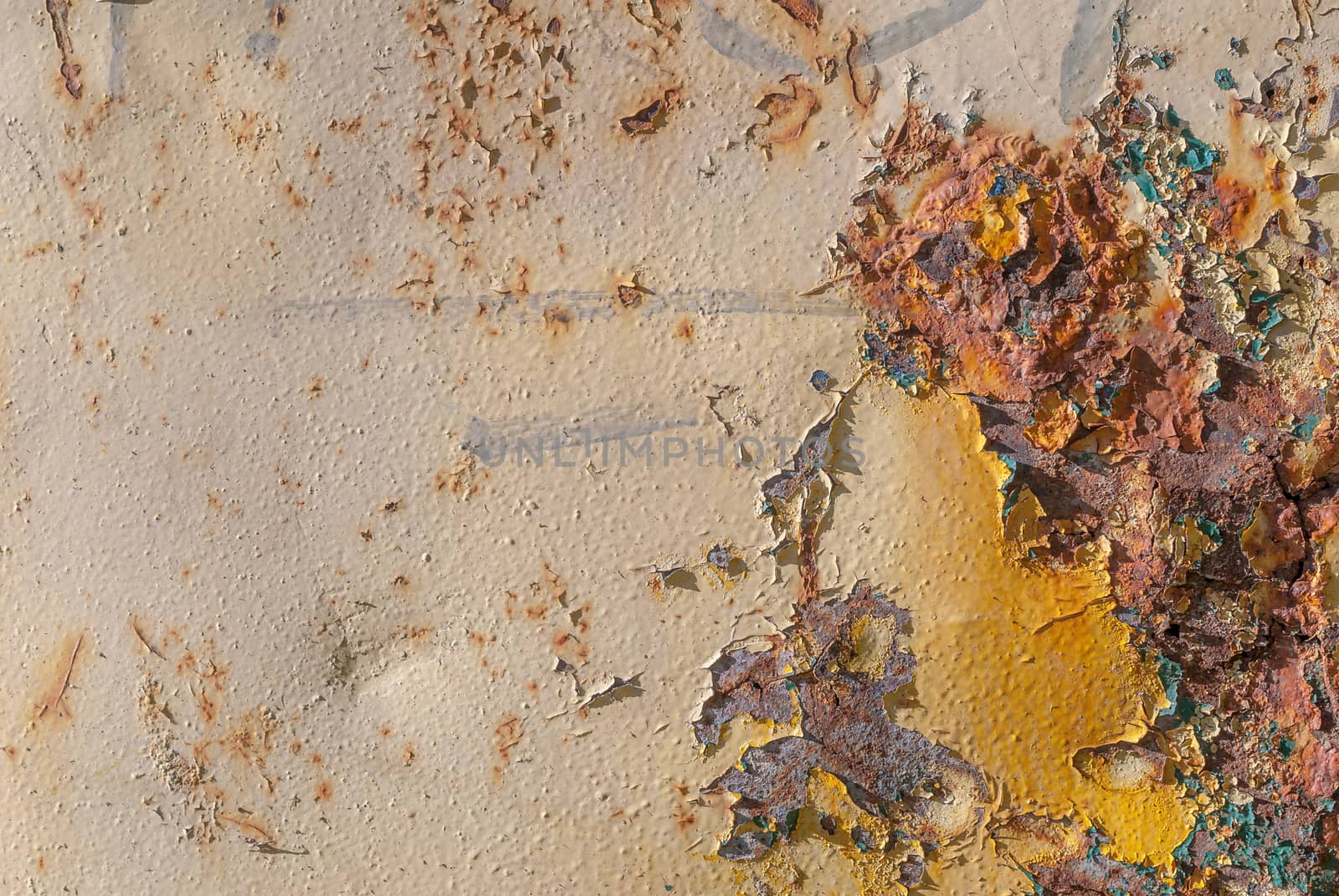 surface of rusty iron with remnants of old paint, chipped paint, texture background by uvisni