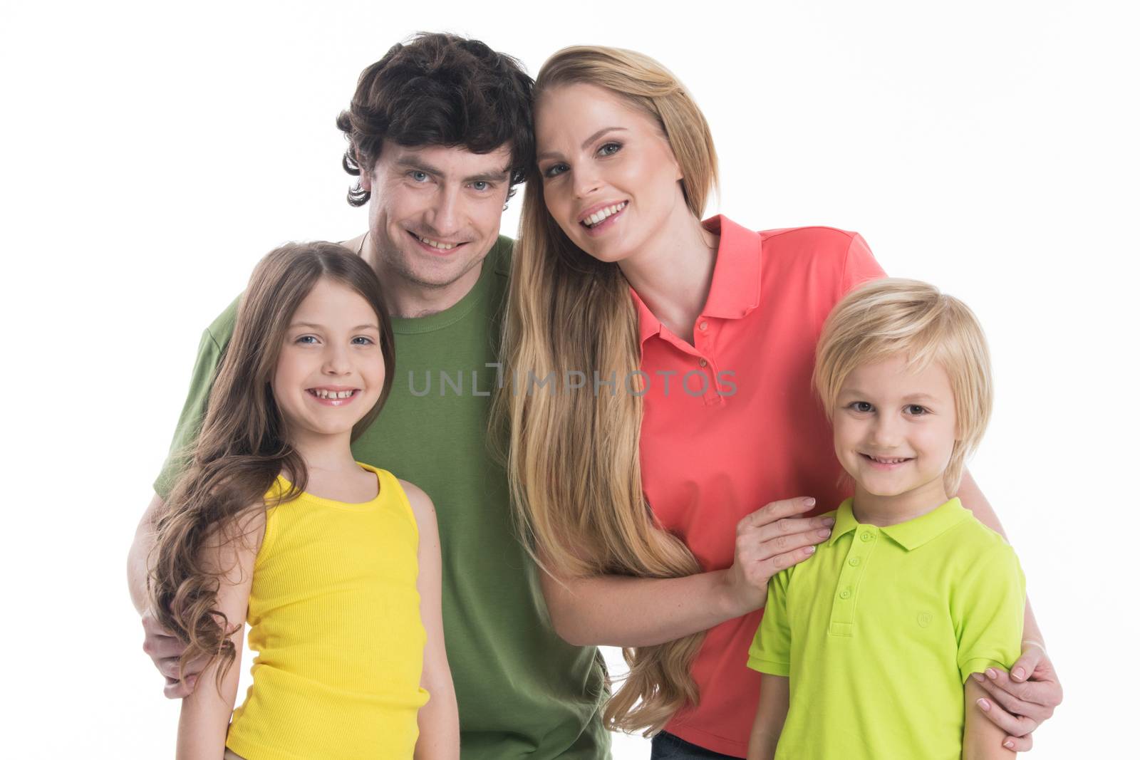 Happy smiling family of two parents and two children isolated on white background