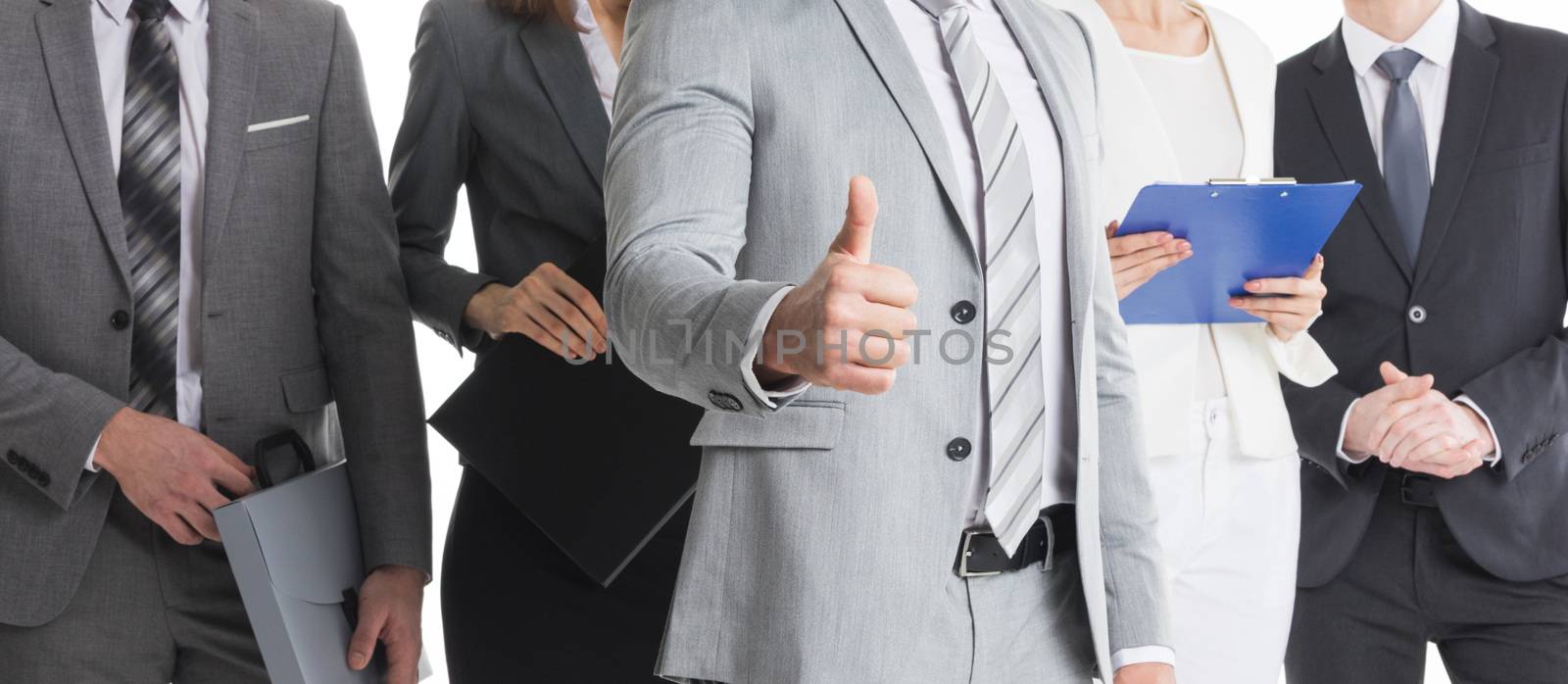 Business people show thumb up by Yellowj