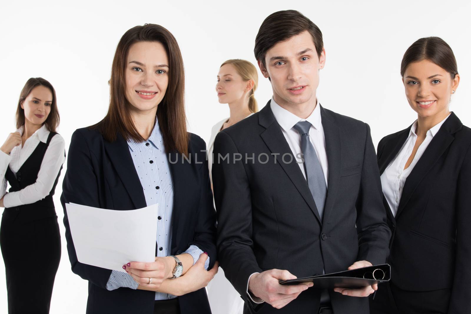Successful business people group team standing together isolated over white background