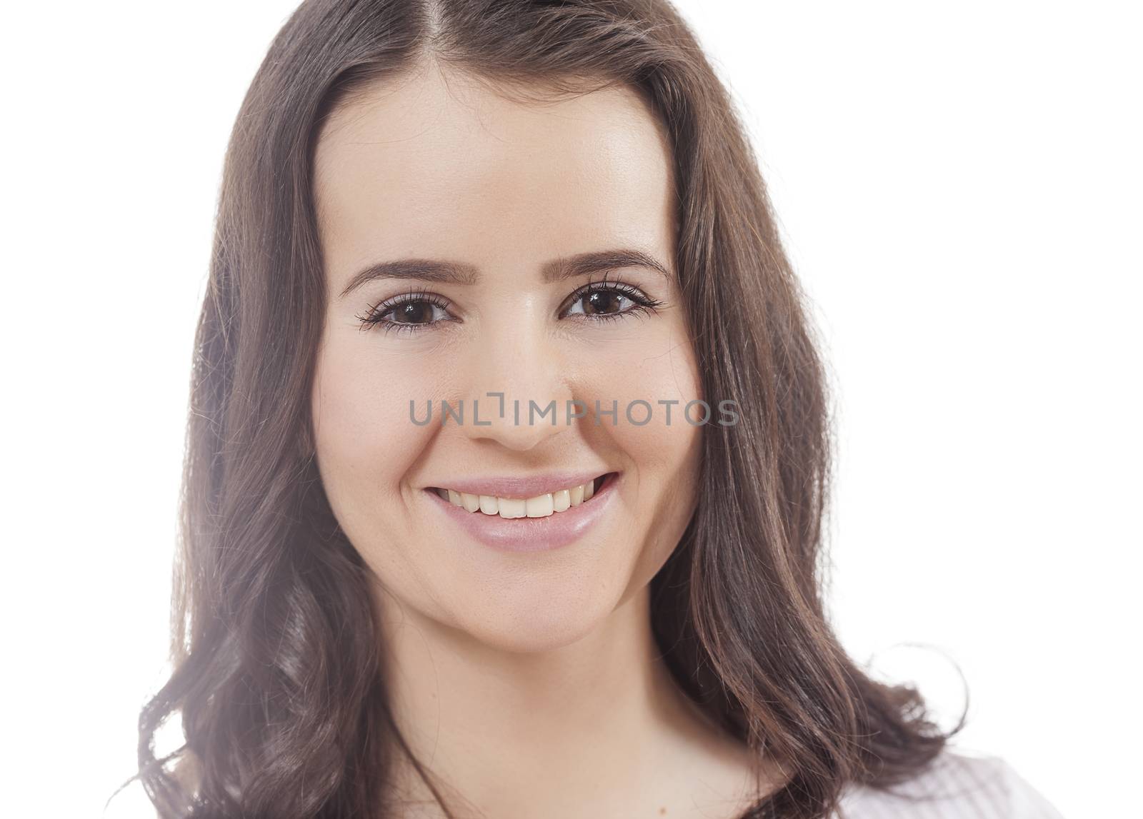 Smiling young woman with long dark hair isolated on white