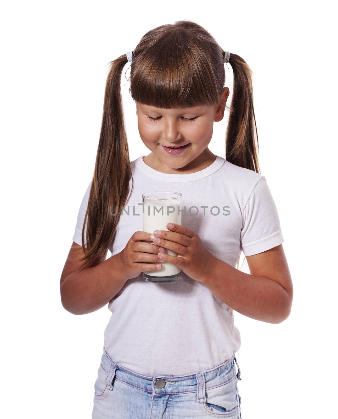 Six years Girl holding glass of milk isolated on white