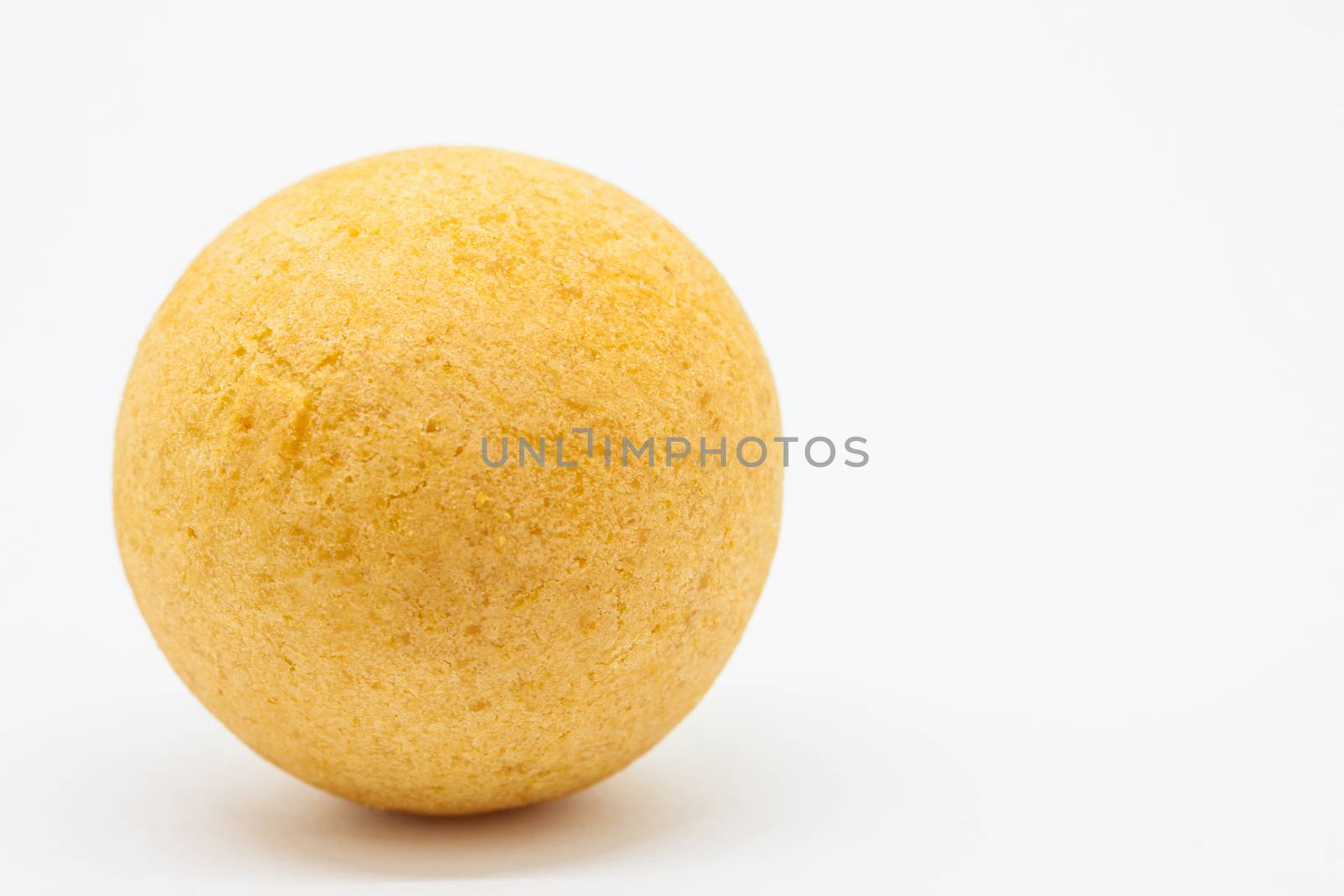 Traditional Colombian buñuelo (Deep Fried Cheese Bread) isolated on white background