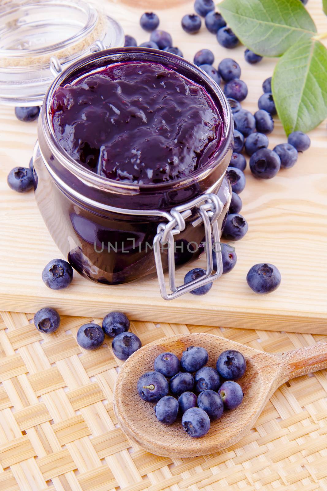 Blueberry fruits jam in the kitchen on the table