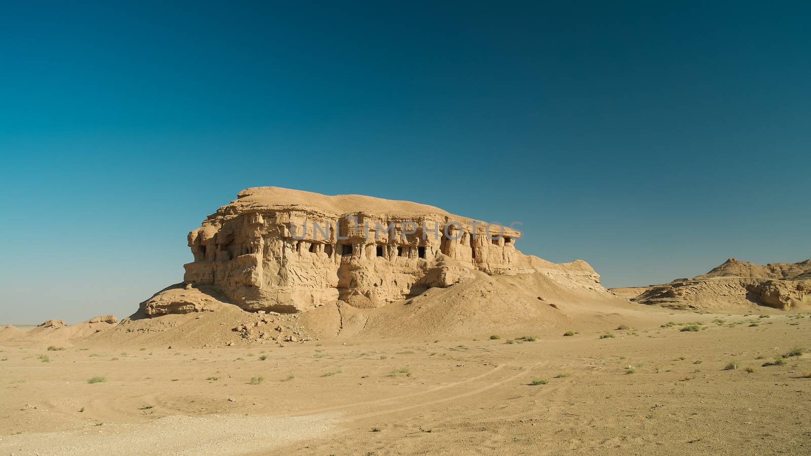 Butte at the dried shore of Razazza lake, Iraq by homocosmicos