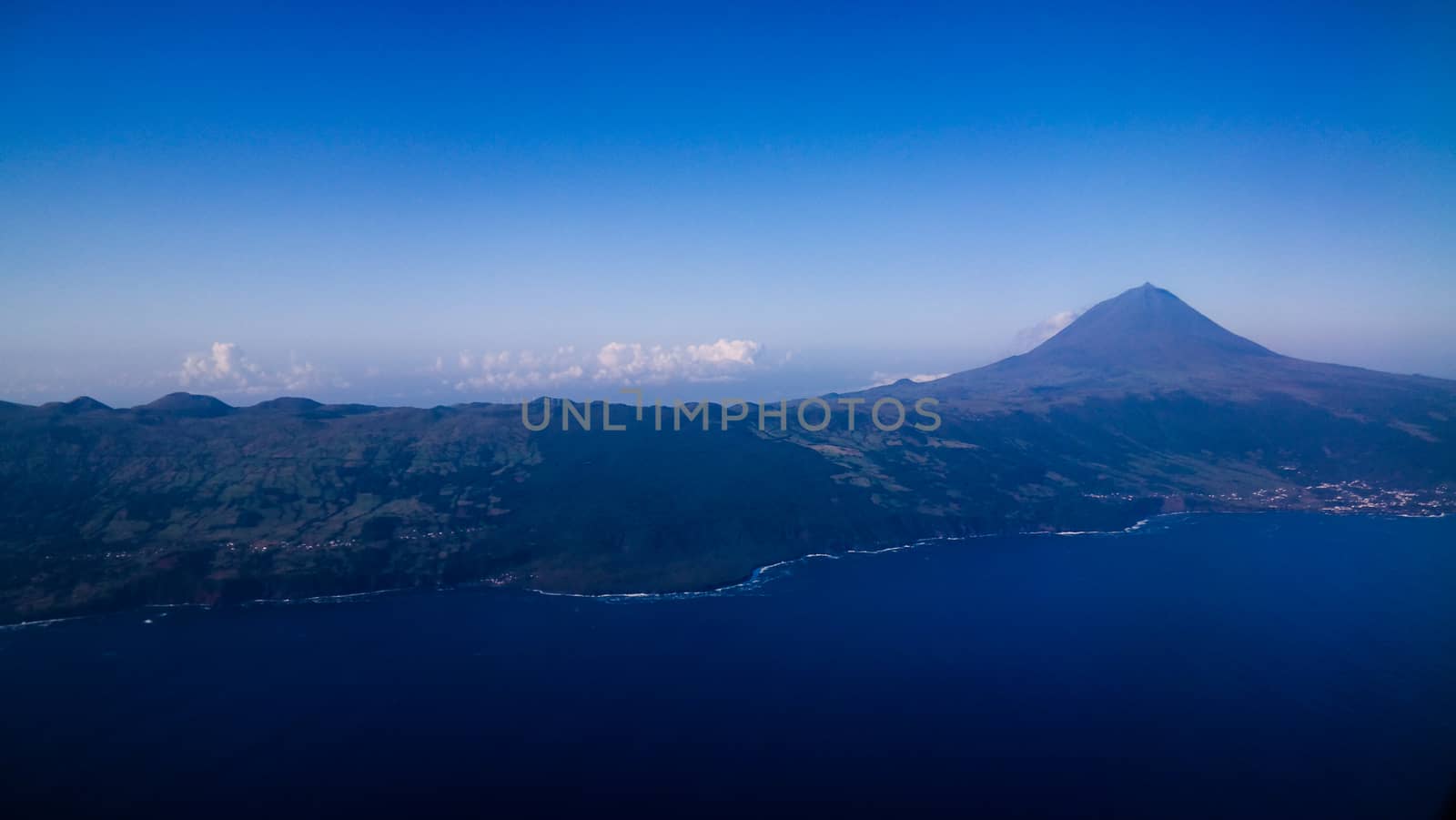 Aerial view to Pico volcano and island, Azores,Portugal by homocosmicos