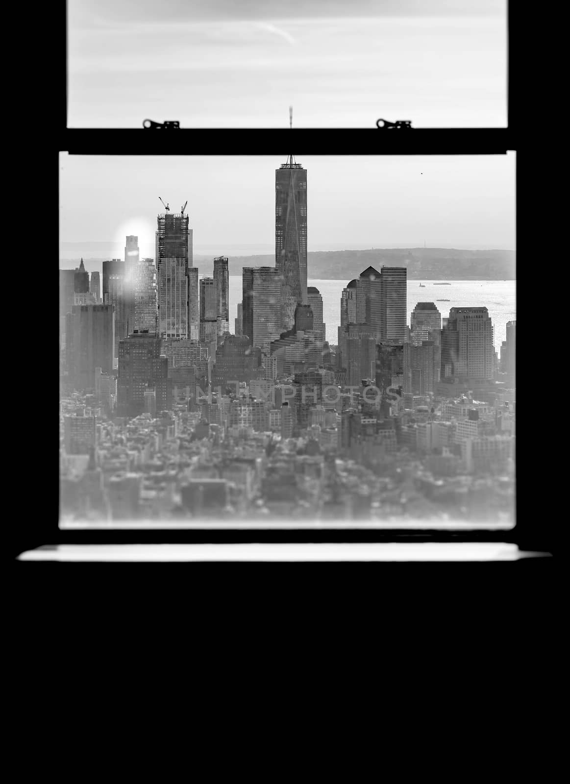 New York black and white skyline viewed through a window frame