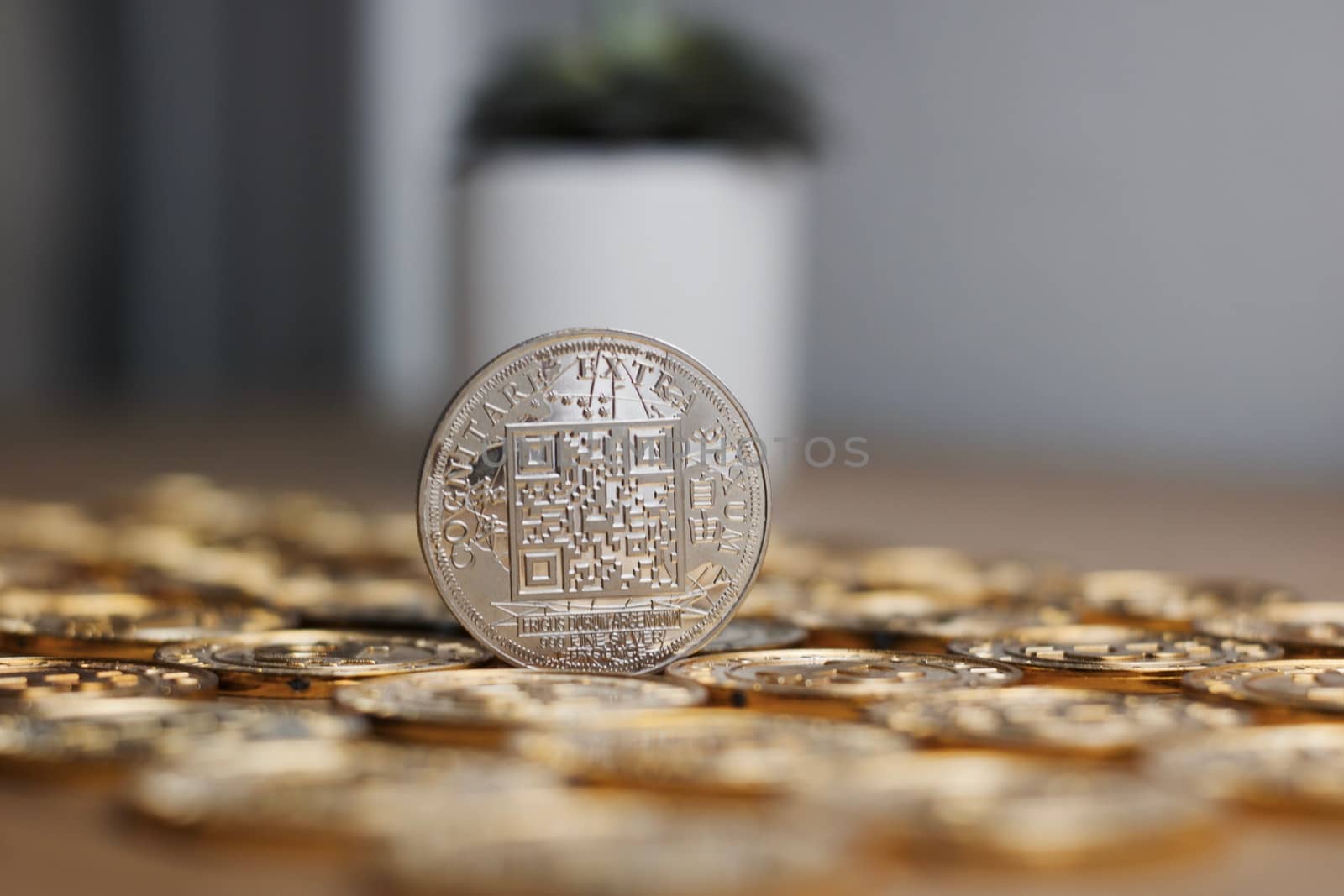 Digital currency physical metal bitcoin coin on the gold money background. Money concept.