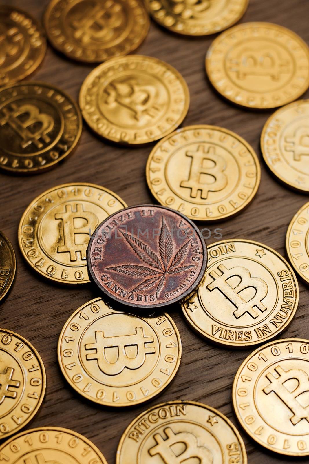 Digital currency physical metal bitcoin coin on the gold money background. Money concept.