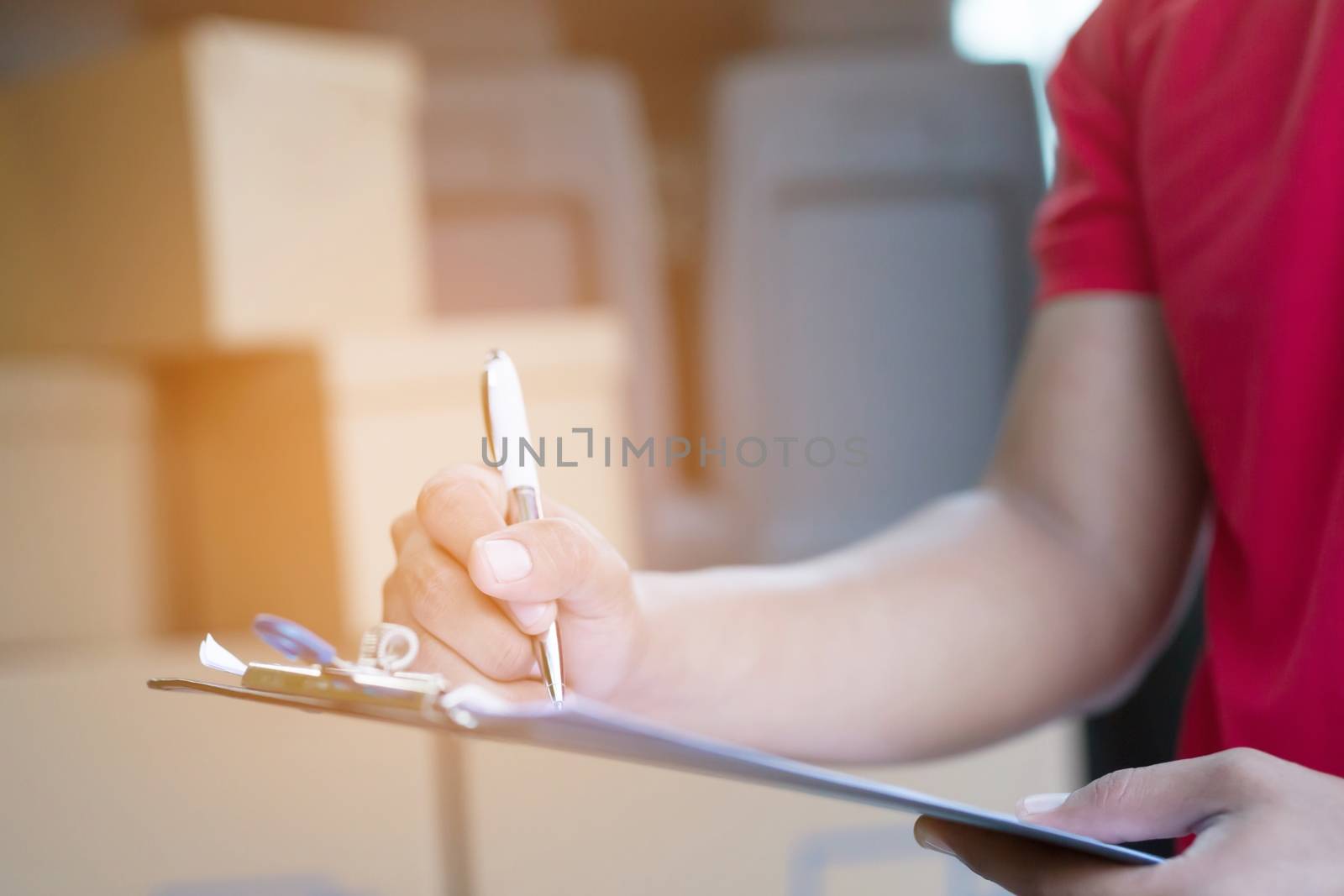 parcel delivery man Counting Check stock Prepare to send the package to the customer. Validate every time in transportation. In order not to make mistakes in the work.