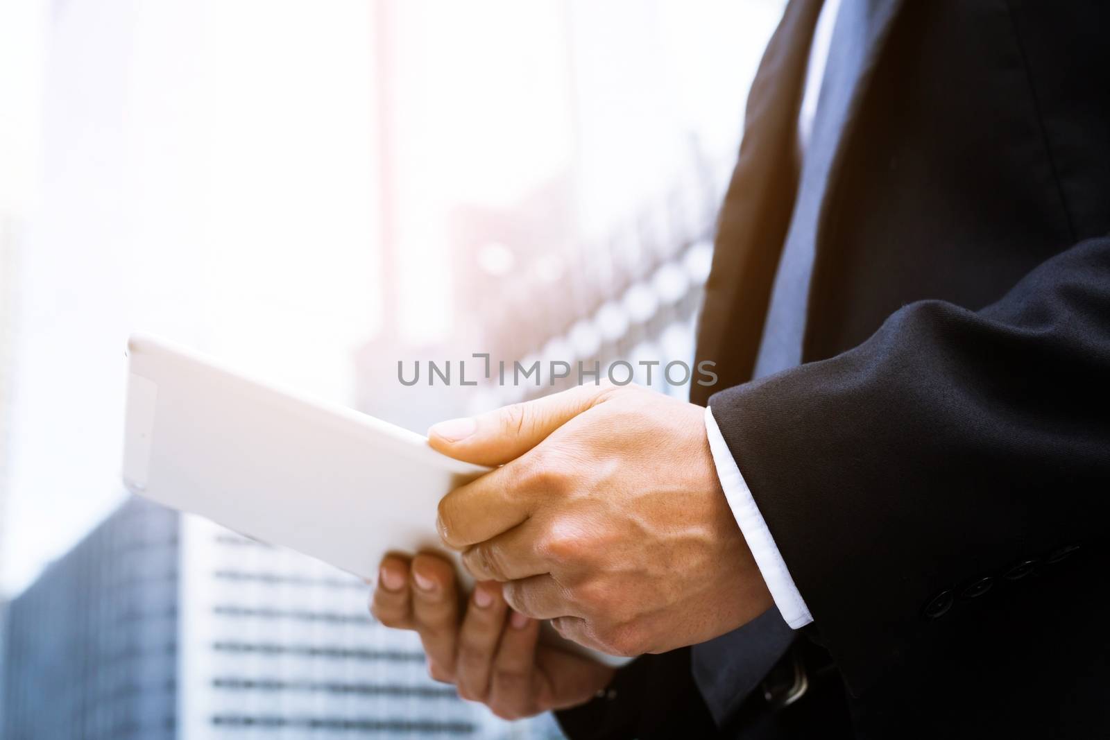 close up hand people businessman using tablet adult working Contact Business Coordinator on a digital.