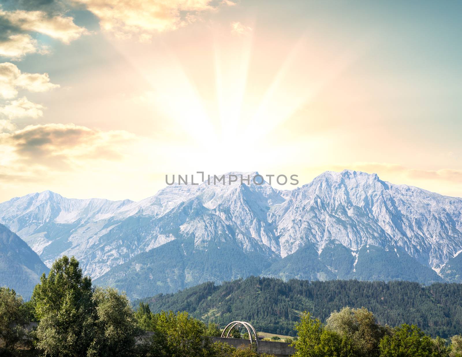 Beautiful dramatic sunset in the mountains. Landscape with sun