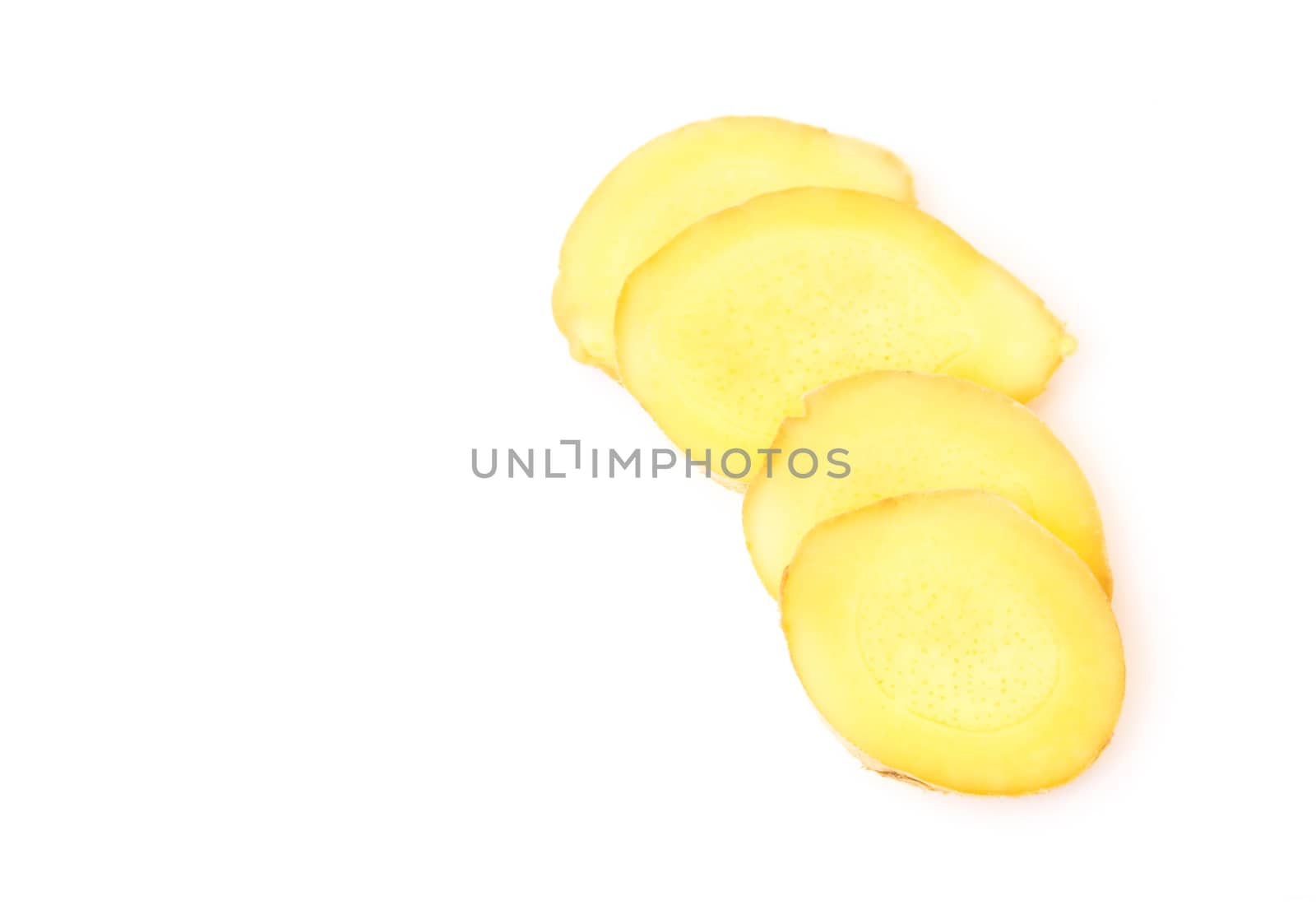 Fresh ginger root with slices on white background for herb and medical product concept, top view