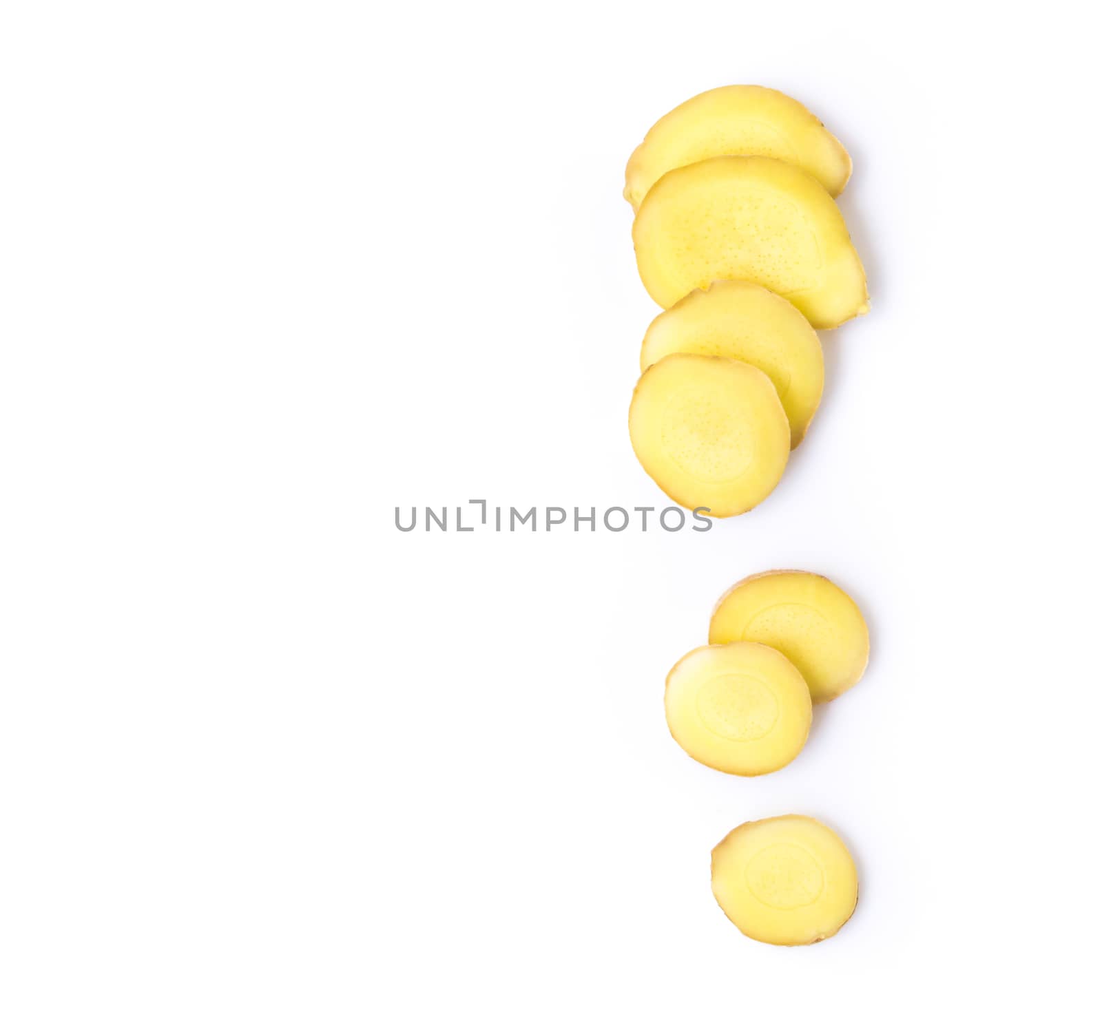 Fresh ginger with slices on white background for herb and medical product concept, top view