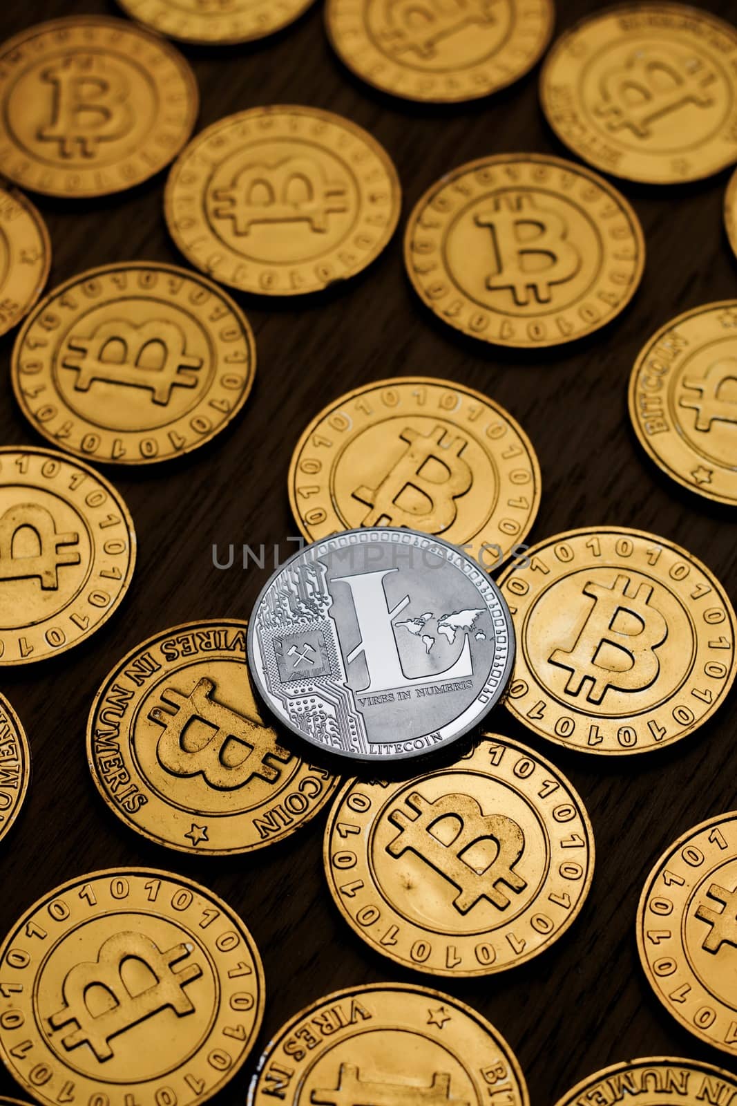 Digital currency physical metal litecoin coin. Cryptocurrency miningn concept.