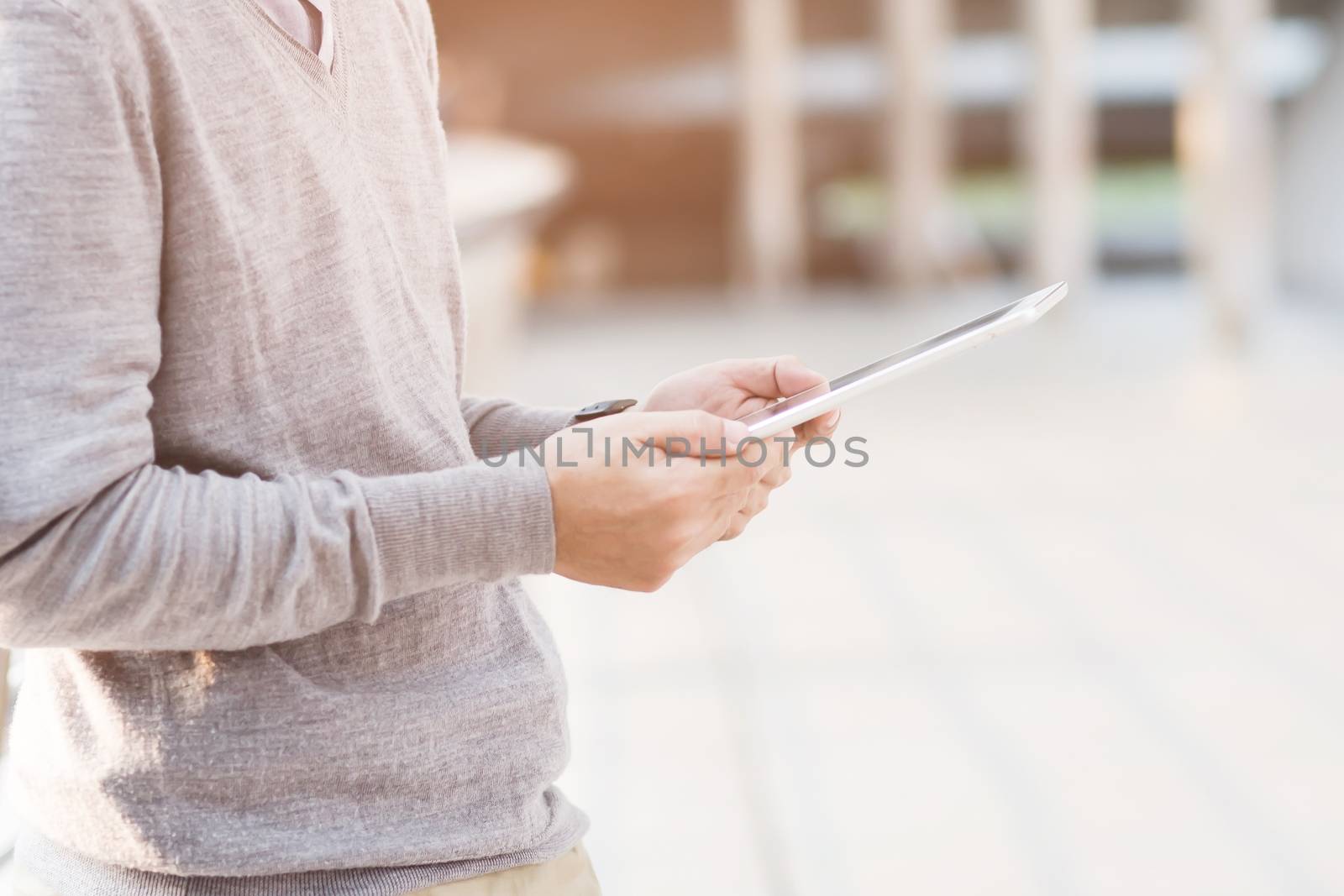 close up of Young Man lifestyle living using tablet.