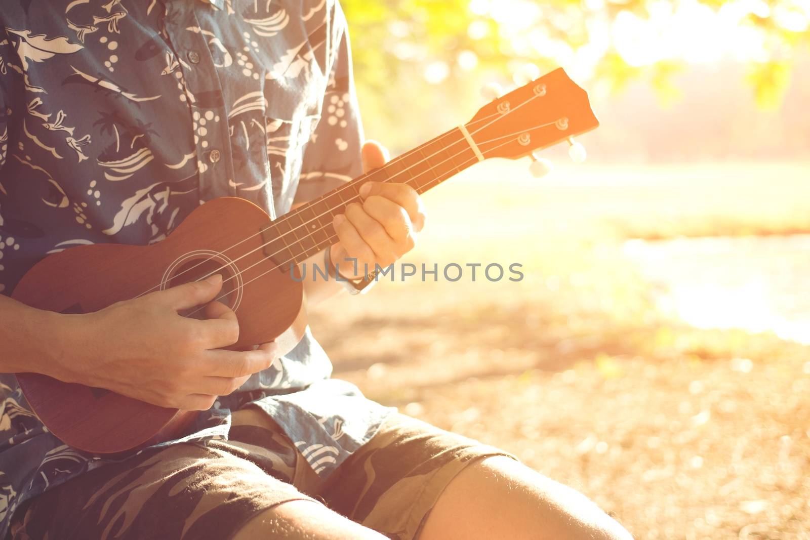Acoustic guitar guitarist playing. Musical instrument with performer hands in parks. by boytaro1428@gmail.com
