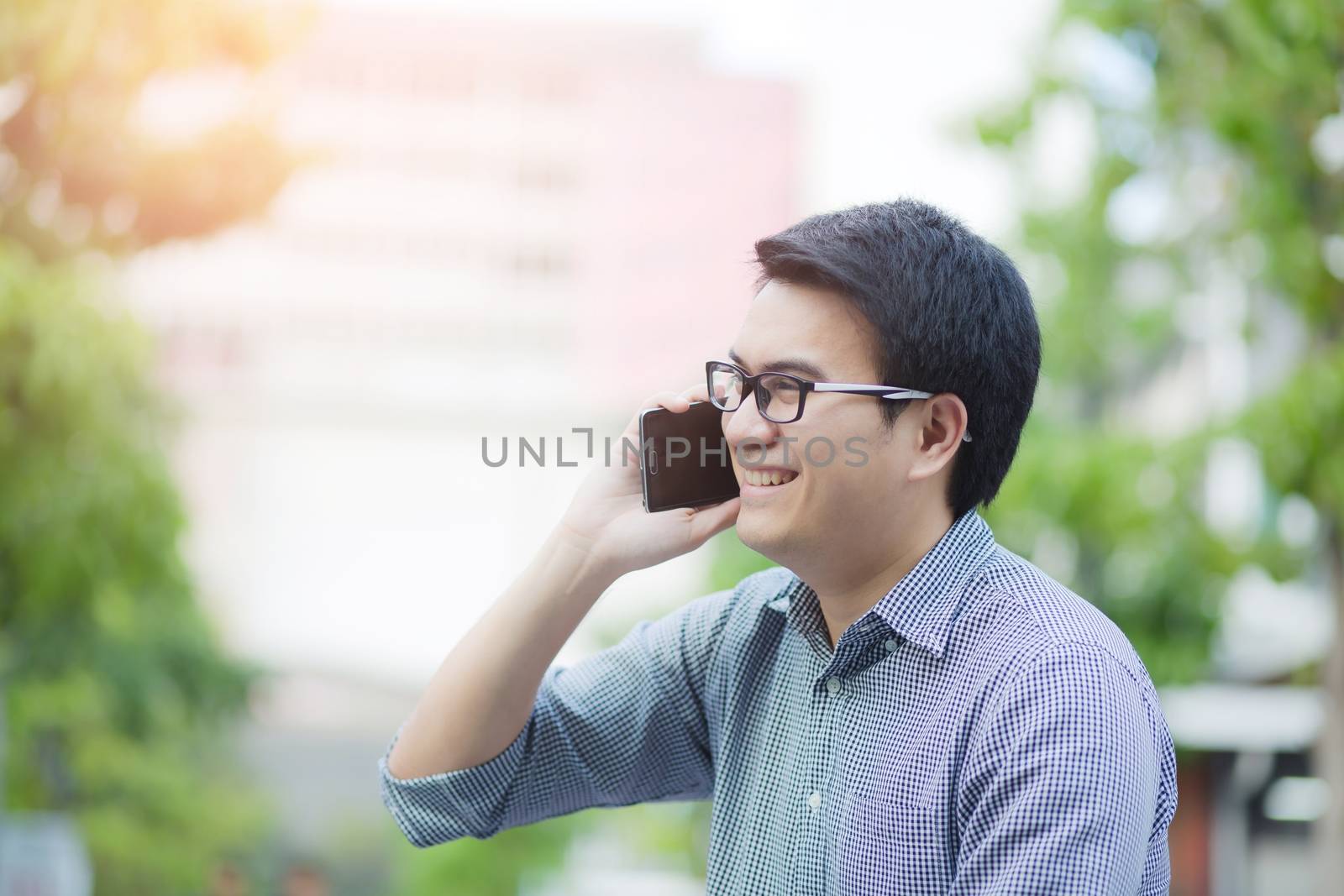 Businessman use smartphones to contact customers