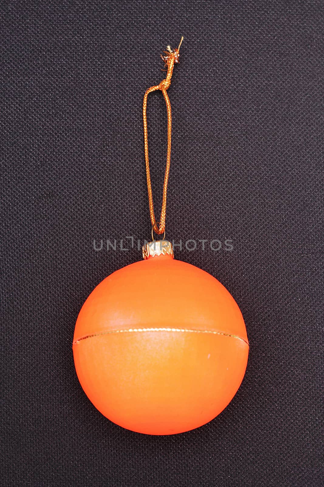 The symbol of Christmas and the new year, Orange Christmas ball. by andsst