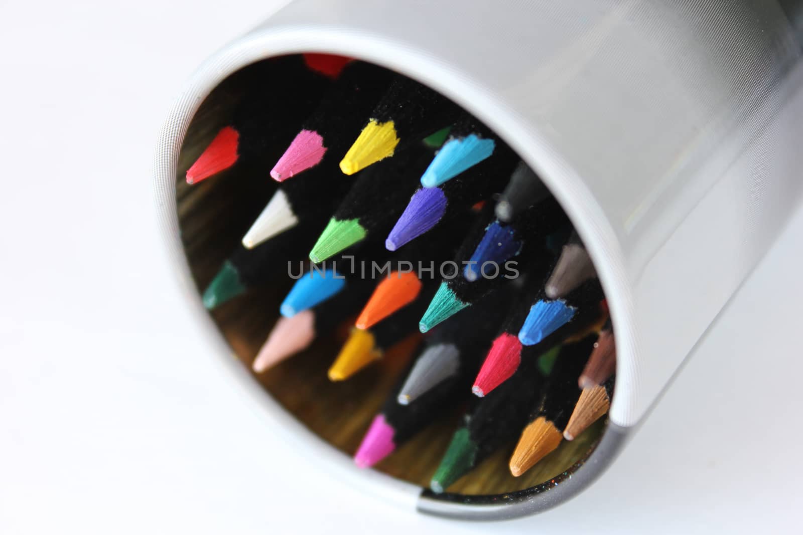 Set of colored pencils for drawing in the round box