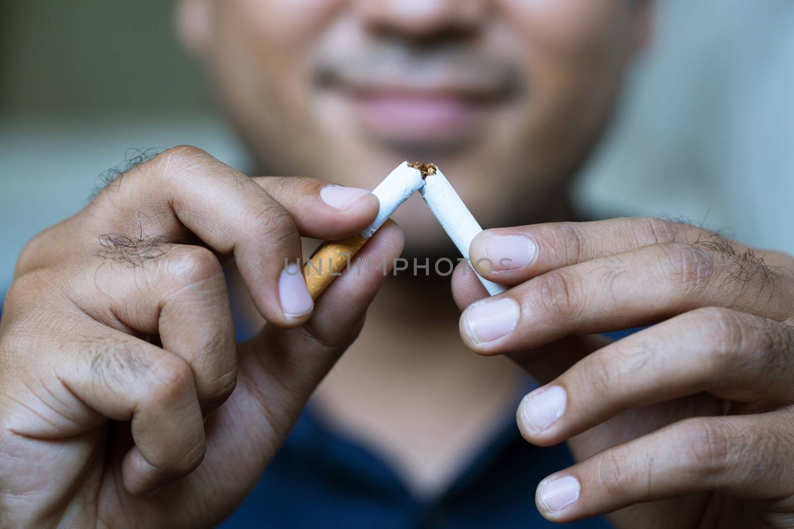A man is smoking by boytaro1428@gmail.com