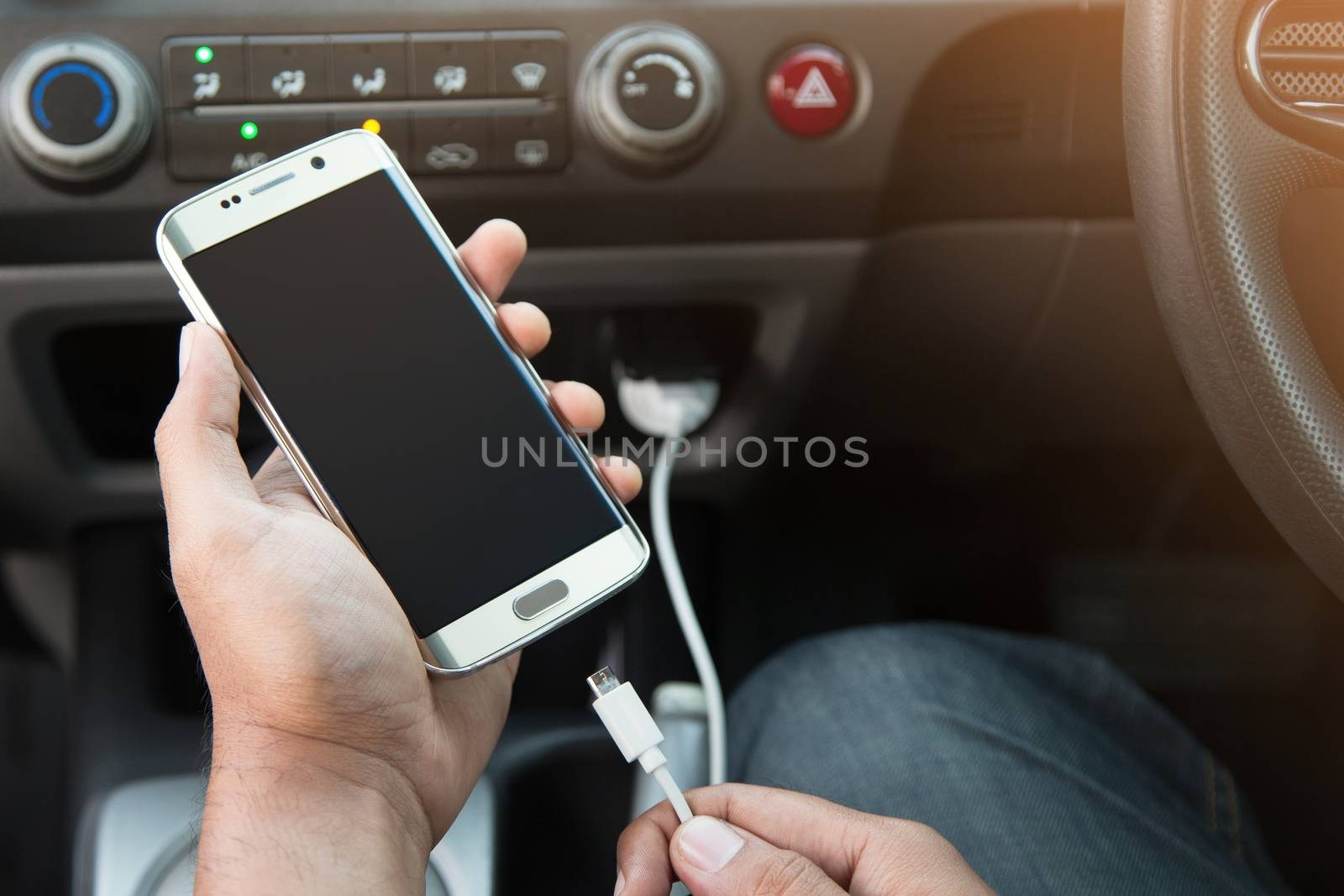 Power plug charging phone in car. by boytaro1428@gmail.com